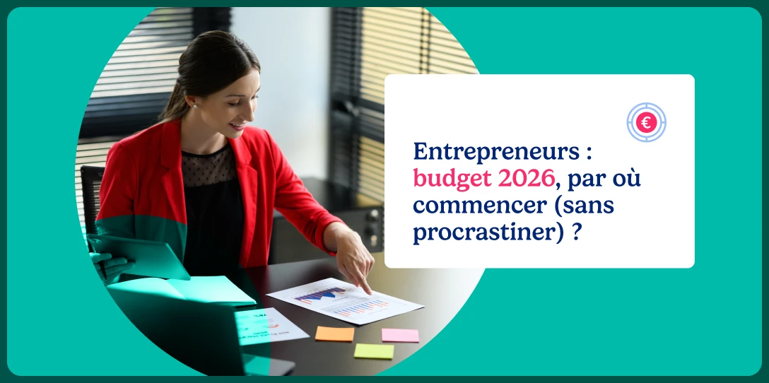 Femme entrepreneure analysant un graphique financier dans un bureau, illustration de la préparation du budget 2026.